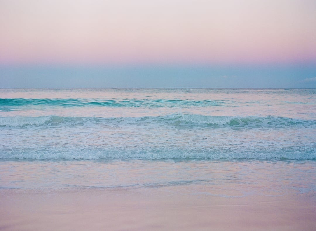 sunrise Bahamas beach pink blue